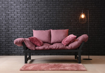 Interior of modern room with comfortable sofa