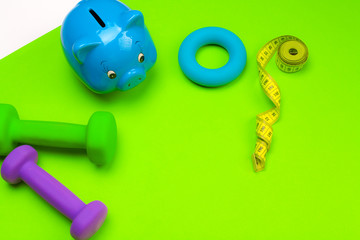 Piggy bank with sports equipment