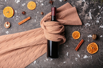Composition with ingredients for tasty mulled wine on grey background