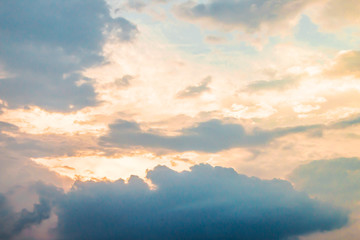 Evening light with clouds and blue sky.