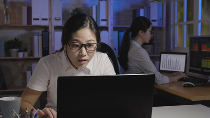 asian businesswoman receiving negative news