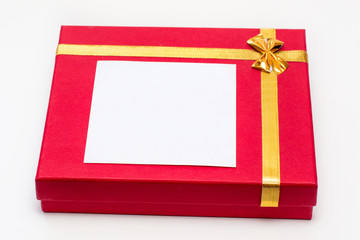 red gift box on white background. Beautiful packaging. A gift to a girl, a woman.