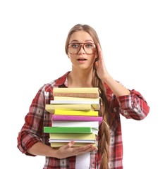 Beautiful young woman with stack of books on white background
