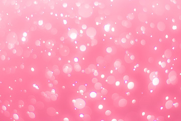 abstract bokeh light effect with soft pink background