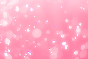 abstract bokeh light effect with soft pink background