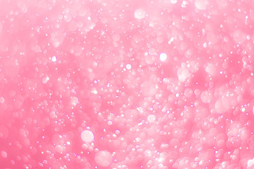 abstract bokeh light effect with soft pink background