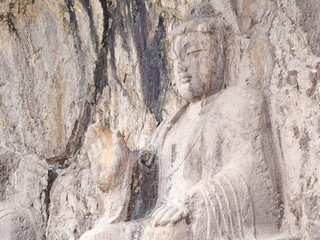 Luoyang Longmen grottoes. Broken Buddha and the stone caves and sculptures in the Longmen Grottoes in Luoyang, China. Taken in 14th October 2018
