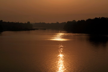 Beautiful views of the sunset over the river in the evening.