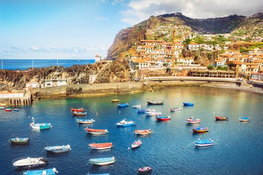 Colorful fishing boats  in Camara de Lobos port. Madeira island, Portugal