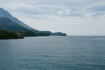 Mountain cascade on the beach.