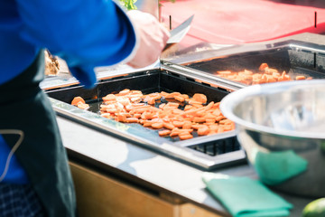 Chefs at work in a restaurant kitchen making delicious food
