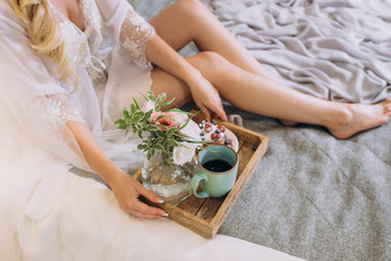 Obraz na płótnie Canvas breakfast in bed to the bride. soft focus