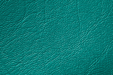 Green or turquoise genuine leather texture background abstract art detail.