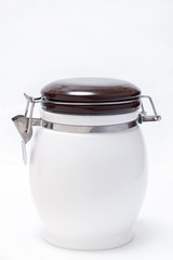 White jar with lid on a metal latch for sugar for bulk products isolated on white background