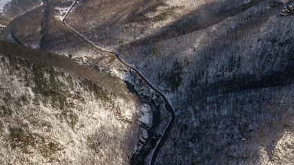 Aerial landscape view, winding road aerial view