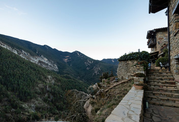 Fototapeta na wymiar Rural farmhouse hotel terrace view on the Pyrenees mountains, Catalonia