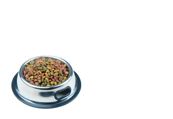 Dry food for pet in stainless bowls on isolated white background