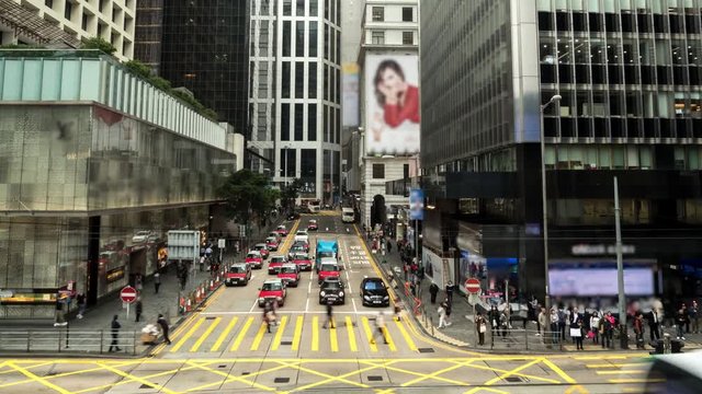 Time lapse of people at a crossing on the road at Hong Kong. Motion time lapse shot.