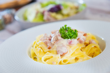 tasty Carbonara pasta on the table