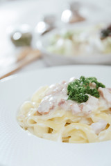 tasty Carbonara pasta on the table