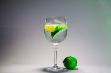 green cocktail with lime