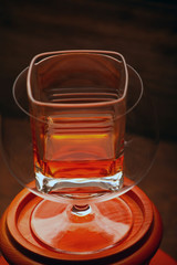 whiskey glass wooden background 