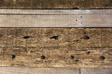 Wood planks texture dark background or wallpaper. overlap wooden wall horizontally have damage of old. Dark brown rustic aged barn wood planks background. Space for text, copy, lettering