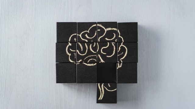 Wooden blocks connecting in abstract human brain, stop motion, animation.
