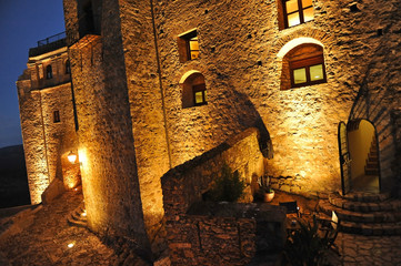Fototapeta na wymiar Medieval castle of Castellar de la Frontera (Old Castellar) illuminated at night, villages of Cadiz, Spain