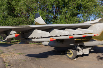 Fototapeta na wymiar Air-to-air missiles on the pylon of the Soviet military aircraft