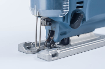 electric jigsaw on white background