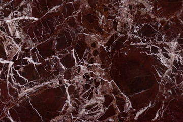 The finishing stone. The polished red marble. Texture.