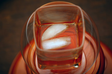 ice whiskey glass wooden background 