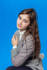 Girl on a blue background is isolated