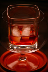 ice whiskey glass wooden background 