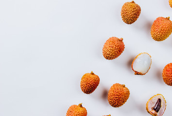 Tropical abstract background. Lychee on the white background.