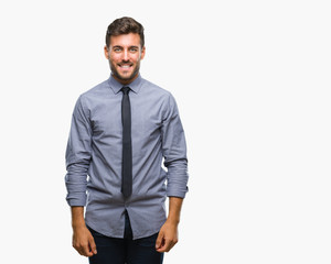 Fototapeta premium Young handsome business man over isolated background with a happy and cool smile on face. Lucky person.