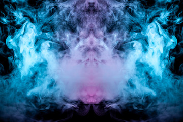 A background of pink, green and white wavy smoke in the shape of a ghost's head or a man of mystical appearance on a black isolated ground. Bright abstract pattern of steam from vape.
