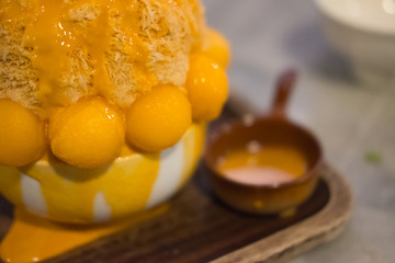 Korean shaved ice dessert with sweet toppings and fruit