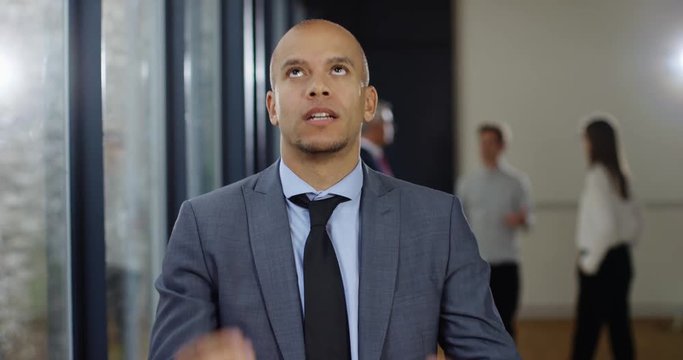 4K Angry businessman dealing sternly with a problem on video conference call