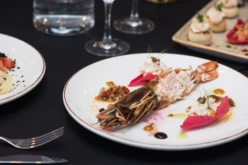Lagustine tartare on christmas table. Tasty restaurant dish