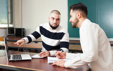 Obraz premium Students preparing for exams in classroom