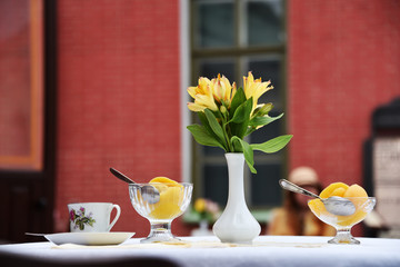 flowers and peaches. yellow lilies
