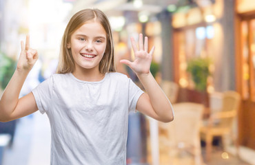 Young beautiful girl over isolated background showing and pointing up with fingers number seven while smiling confident and happy.