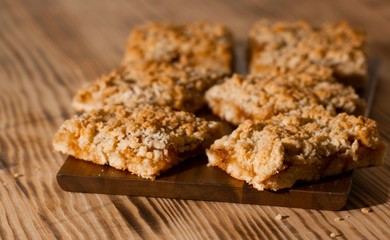 homemade apple pie on wooden background close up with copy space