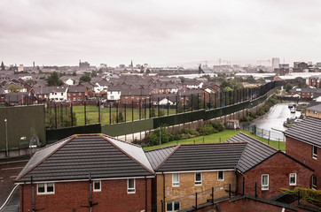 Wall Dividing Protestant and Catholic Belfast Neighborhoods