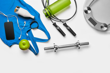 Sport, fitness, healthy lifestyle, cardio training and objects concept - close up of female sports...