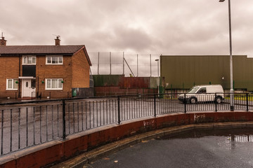 Wall Dividing Protestant Neighborhood in Belfast from Catholic Area