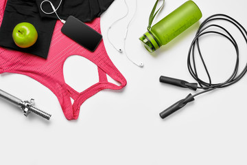Sport, fitness, healthy lifestyle, cardio training and objects concept - close up of female sports...