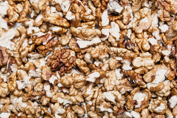 Peeled nuts are an even layer. View from above